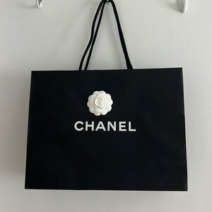 Chanel shopping bag with magnolia in center